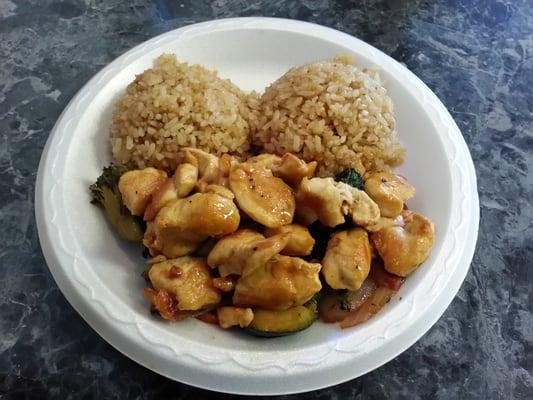 $6.95 - Teriyaki Chicken - 3 Stars - A 10" paper plate of chicken stir fry and lots of rice. Good flavor.