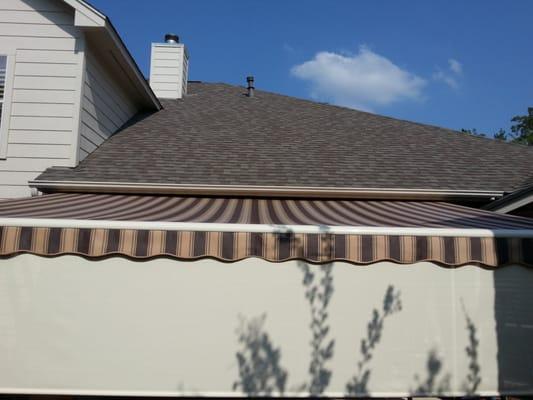 20' Retractable Awning with 90% sunscreen on front bar.