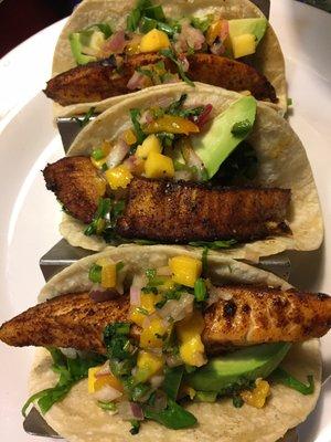 Fish Tacos! Fantastic! Mango salsa with whole avocado slices on each taco!