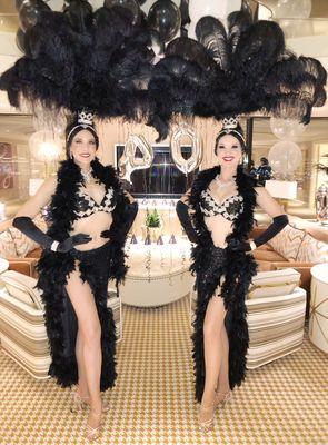 Our Las Vegas showgirls dressed in black bikini style showgirl costumes.