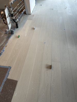 credit card sized gaps in the floor