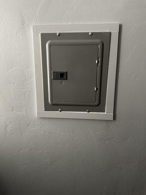 Electrical panel in room.