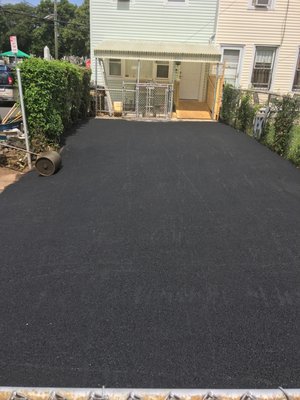 Ripped out old driveway and extended with new asphalt