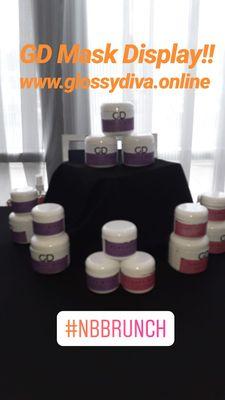 Display of our 2oz and 4 oz Glossy Diva Charcoal Clay and Rose Petal Paste Mask.