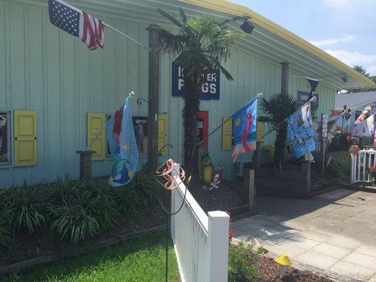 The irony that their own flag was furled.  Unfortunately I couldn't reach it to fix it. I like the mermaid flag.  Fun!