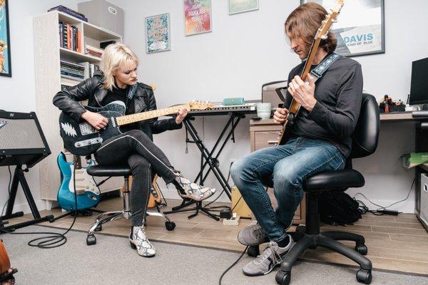 Student learning the guitar