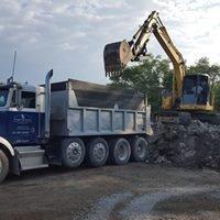 In addition to concrete, RII hauls the biggest loads in town with quad axles and end dumps that work great alongside our earthwork equipment