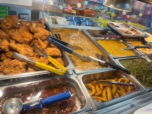 Hot bar showing the Fried Chicken, Salsbury Steak, Onion Rings, Corn, Green Beans as posted on their Facebook 3/22/24