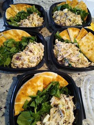 chicken salad loaded with grapes and pecans and a side pita