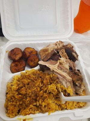 What I ordered.. Pork, rice and peas and plantain. Tasty