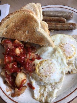 2 eggs, maple sausage, home fries and sourdough toast!