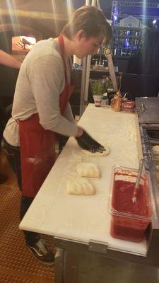 Dalton stretching out the dough