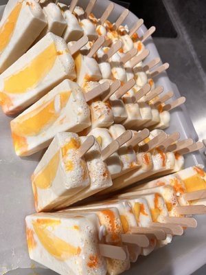 Mango and cream popsicles