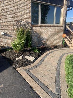 Give your homes landscaping some fresh mulch & have your flower beds treated to keep weeds from ruining your summer!