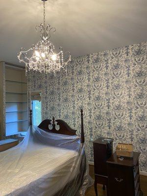 Tradicional toile wallpaper for master bedroom.