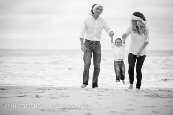 Mom and Dad Swinging Child on Amelia Island Beach