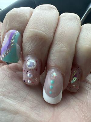 Aphrodite nail aesthetic.  The ladies always do a great job with my requests!!