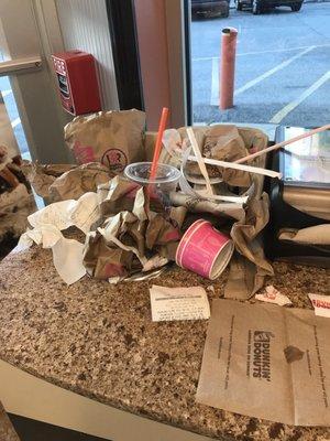 10/10/17 Typical scene at this location; the garbage is overflowing.