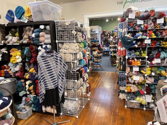 Large winding setup for yarn storage and display. Note finished objects are not for sale and are for display only.