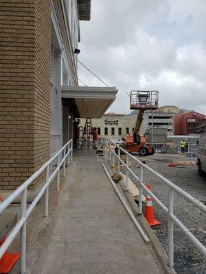 Still bringing the lifts in to finish The Law Offices of Thomas J Henry Building