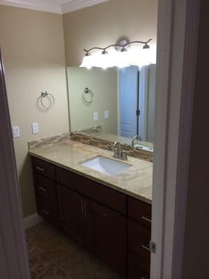 AFTER - Master bath vanity area - now with enclosed wall + door