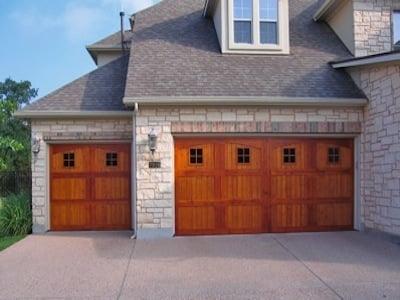 We also install beautiful, custom cedar garage doors made right here in DFW.