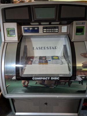 An old CD based jukebox. Evidently it needs a little work but looks very interesting.