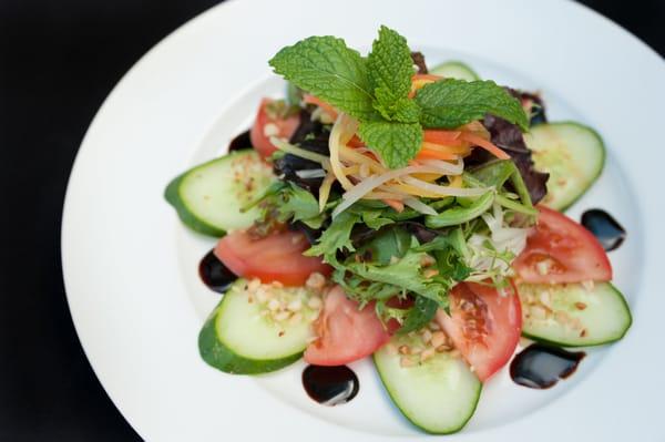 Nalo Green Salad with Ho Cucumbers, Ume Balsamic, Pickled Green Papaya, Sweet Onion Lilikoi Dressing