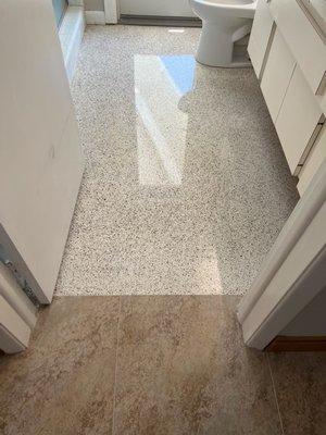 Another view of another bathroom floor, Terrazzo New that's been restored to a magnificent shine