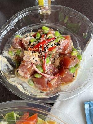 Poki bowl had snap peas, seaweed salad, fresh Tuna.  It was excellent.