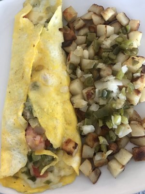 Light omelet w Swiss cheese & potatoes w onion and peppers