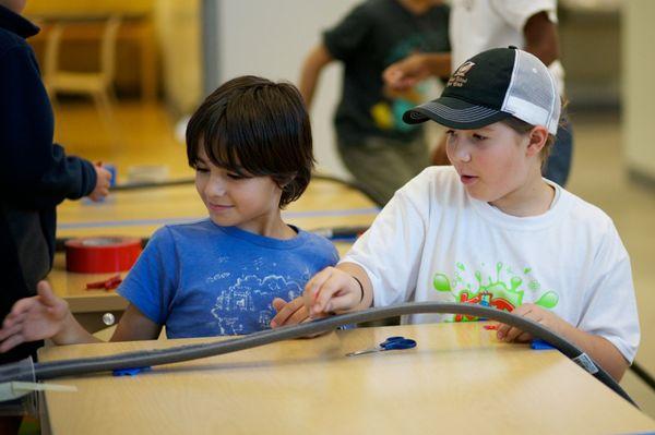 Momentum by creating our own roller coasters