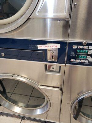 This is a dryer. Why does the sign say no cold water. But of course broken.