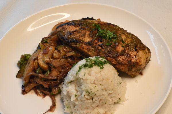 Coconut rice paired with rum sugar vegetables and cilantro chicken