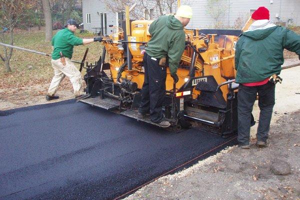 Our crew paving an asphalt driveway.