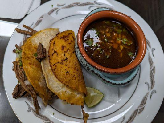 Birria tacos and consommé