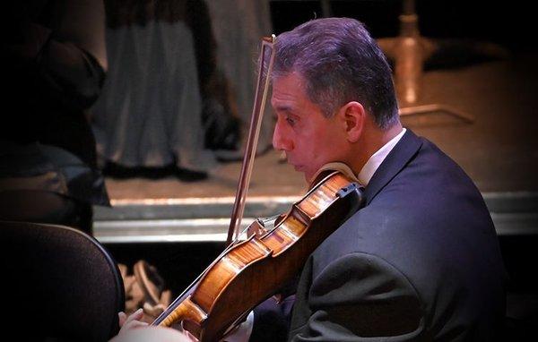 Mr. Garza performing with the International Symphony Orchestra