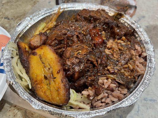 Stew Chicken with rice and peas.