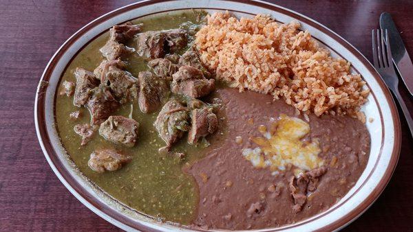 Stupendous Chile Verde with refried beans and rice- all delicious ‍