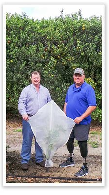 Tree Defender creators, Tommy Thayer & Scotty Thompson with the original design of the Tree Defender back in 2015.