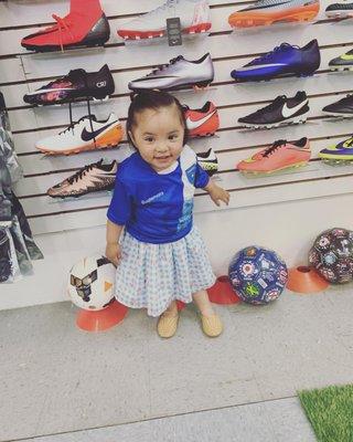 so many soccer cleats and soccer balls for all sizes!