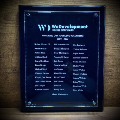 Custom Etched Black Plaque for WeDevelopment Federal Credit Union in Kansas City.