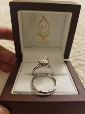 Platinum engagement ring + matching wedding band