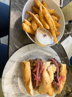 Route 7 Chopped ribeye steak, shredded romaine, tomato jam, garlic mayo, red onion, sweet mixed peppers, provolone cheese