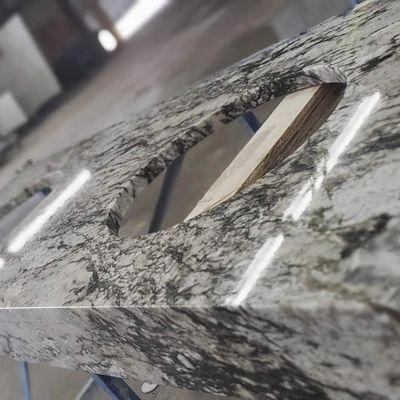 Mitered edging on beautiful White Truffle granite