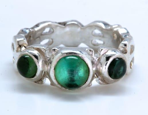 Sea foam green tourmaline three stoner ring. In silver and gold. The shop offers dark stuff to pretty pretty.