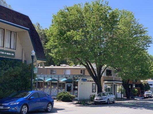 Has its own small parking lot with plenty of other parking spots around the store.