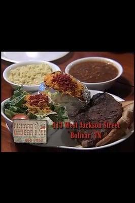 Yummy steak, baked potato, salad, beans & potato salad! Best food in town!