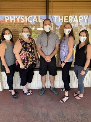 Staff with masks for COVID 19 precautions