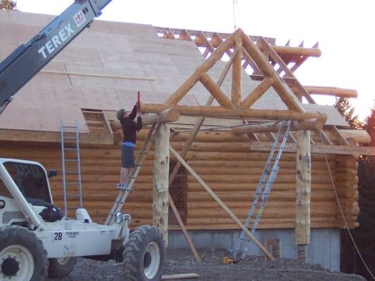 Montana School of Log Building's contracting division builds "Handcrafted" log home.  Reliable, high quality log homes.